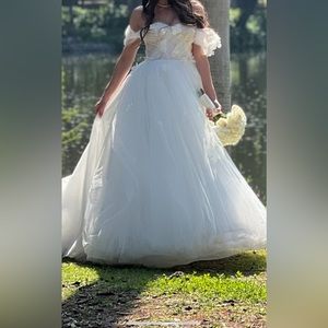 Ivory wedding gown with 3D flower detail